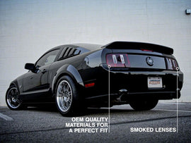 Raxiom 05-09 Ford Mustang Coyote Tail Lights- Black Housing (Smoked Lens)
