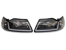 Load image into Gallery viewer, Raxiom 99-04 Ford Mustang Axial Series Headlights w/ Sequential LED Bar- Black Housing (Clear Lens)
