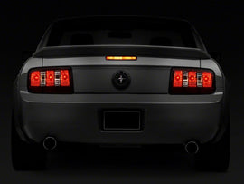 Raxiom 05-09 Ford Mustang Coyote Tail Lights- Black Housing (Smoked Lens)