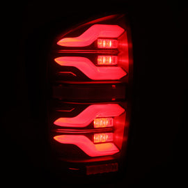 AlphaRex 16-21 Toyota TacomaLUXX LED Taillights Blk w/Activ Light/Seq Signal - Mo-Moto