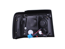 Load image into Gallery viewer, ANZO 1992-1996 Ford F-150 Projector Headlights w/ Halo Black w/ Side Markers and Parking Lights - Mo-Moto